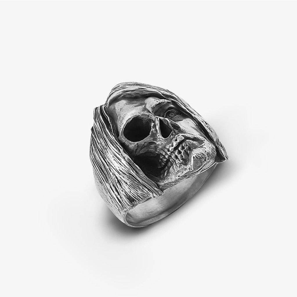 Anello Kurt Cobain Metà Teschio Argento